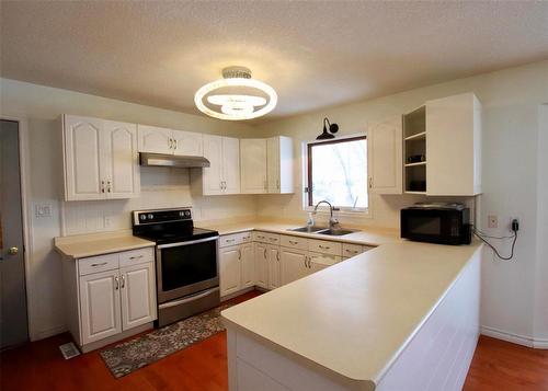 Kitchen - 77 Guymer Crescent, The Pas, MB - Indoor Photo Showing Kitchen With Double Sink