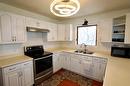 Kitchen - 77 Guymer Crescent, The Pas, MB  - Indoor Photo Showing Kitchen With Double Sink 