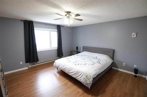 Primary Bedroom w2 Pce Ensuite - 77 Guymer Crescent, The Pas, MB - Indoor Photo Showing Bedroom