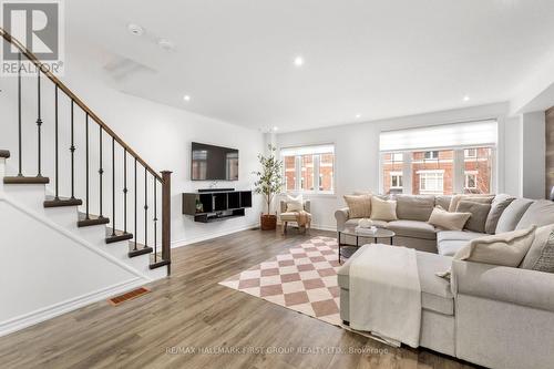 93 Markham Trail, Clarington (Bowmanville), ON - Indoor Photo Showing Living Room With Fireplace
