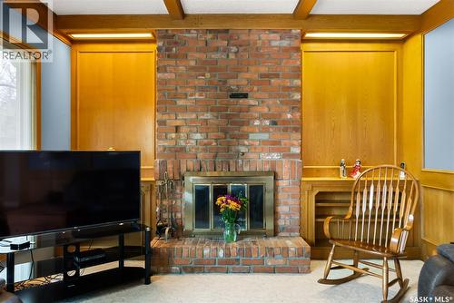 122 Groome Avenue, Regina, SK - Indoor Photo Showing Other Room With Fireplace