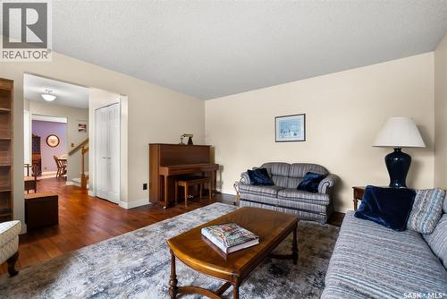 122 Groome Avenue, Regina, SK - Indoor Photo Showing Living Room With Fireplace