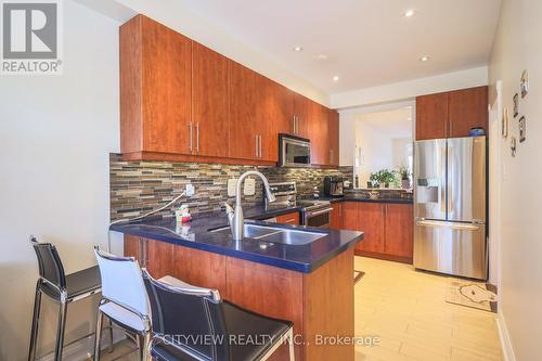 3593 Kariya Drive, Mississauga, ON - Indoor Photo Showing Kitchen With Stainless Steel Kitchen With Double Sink With Upgraded Kitchen
