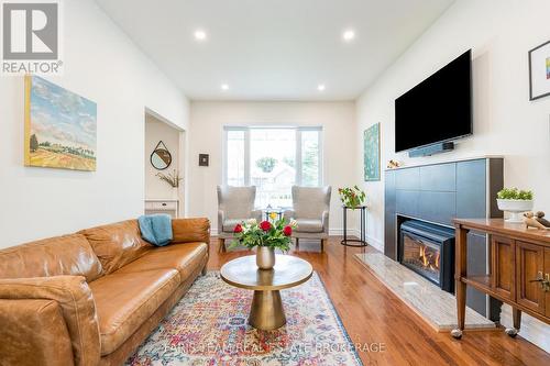 7 Bailey Crescent, Tiny, ON - Indoor Photo Showing Living Room With Fireplace