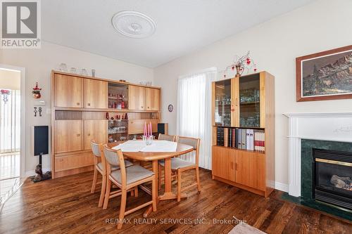 10 Orchard Park Gate, Brampton, ON - Indoor Photo Showing Dining Room With Fireplace