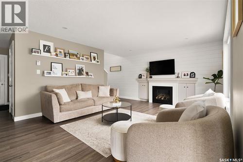 5122 Snowbirds Crescent, Regina, SK - Indoor Photo Showing Living Room With Fireplace