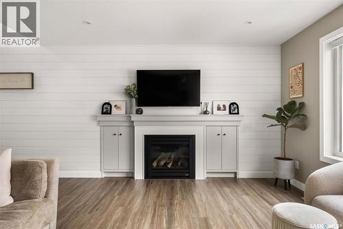 5122 Snowbirds Crescent, Regina, SK - Indoor Photo Showing Living Room With Fireplace