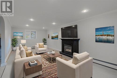 9 Ridge Road, Holyrood, NL - Indoor Photo Showing Living Room With Fireplace