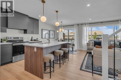 404 155 Mcfaull Way, Saskatoon, SK - Indoor Photo Showing Kitchen With Upgraded Kitchen