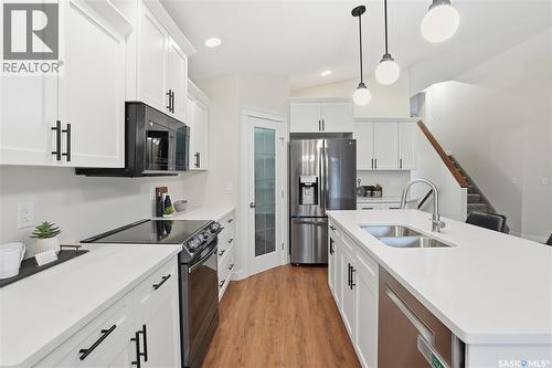 703 Beechdale Way, Saskatoon, SK - Indoor Photo Showing Kitchen With Stainless Steel Kitchen With Double Sink With Upgraded Kitchen