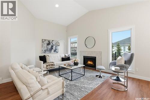 703 Beechdale Way, Saskatoon, SK - Indoor Photo Showing Living Room With Fireplace