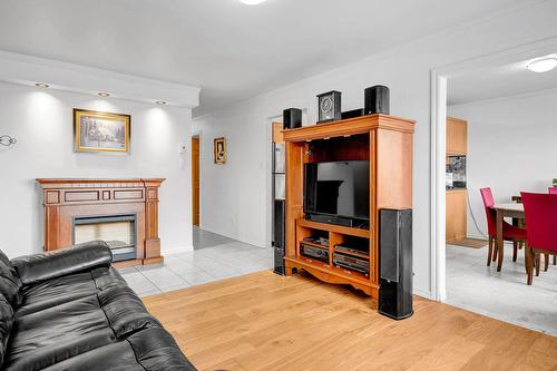 Salon - 402-3360 Rue Charles-Best, Laval (Chomedey), QC - Indoor Photo Showing Living Room With Fireplace