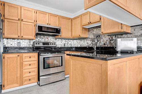 Cuisine - 402-3360 Rue Charles-Best, Laval (Chomedey), QC - Indoor Photo Showing Kitchen With Double Sink