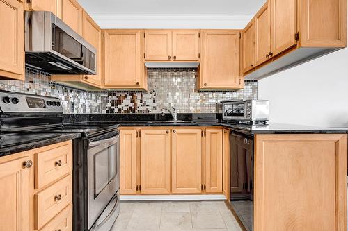 Cuisine - 402-3360 Rue Charles-Best, Laval (Chomedey), QC - Indoor Photo Showing Kitchen With Double Sink
