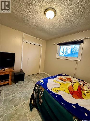 719 Donald Street, Hudson Bay, SK - Indoor Photo Showing Bedroom
