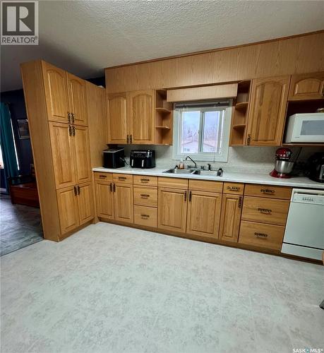 719 Donald Street, Hudson Bay, SK - Indoor Photo Showing Kitchen With Double Sink