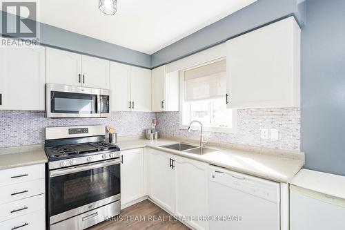 24 Marsellus Drive, Barrie, ON - Indoor Photo Showing Kitchen With Double Sink