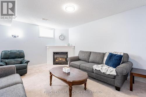 24 Marsellus Drive, Barrie, ON - Indoor Photo Showing Living Room With Fireplace