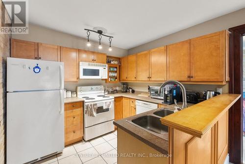 401 - 79 King Street W, Cobourg, ON - Indoor Photo Showing Kitchen With Double Sink