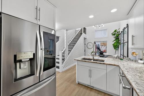 667 South Crest Drive, Kelowna, BC - Indoor Photo Showing Kitchen With Stainless Steel Kitchen With Double Sink With Upgraded Kitchen