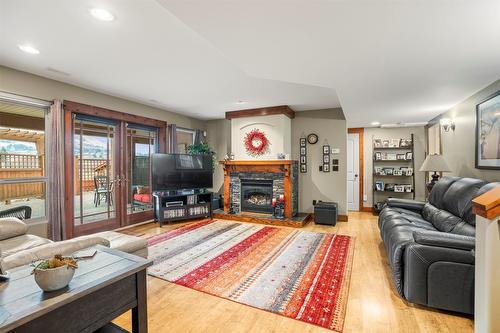 289 Inverness Drive, Coldstream, BC - Indoor Photo Showing Living Room With Fireplace