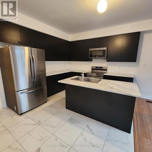 35 Tamworth Terrace, Barrie, ON - Indoor Photo Showing Kitchen With Double Sink