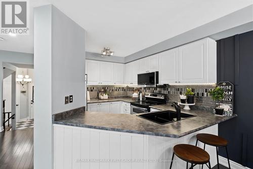 1696 Woodgate Trail, Oshawa, ON - Indoor Photo Showing Kitchen With Double Sink