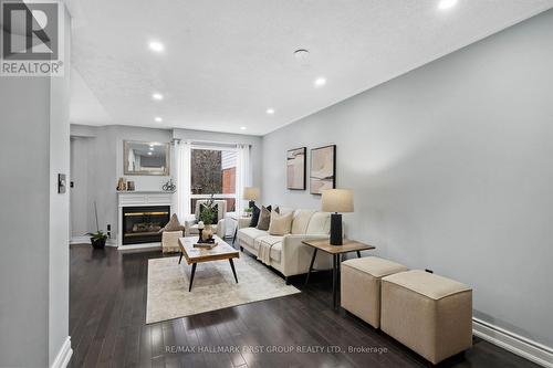 1696 Woodgate Trail, Oshawa, ON - Indoor Photo Showing Living Room With Fireplace