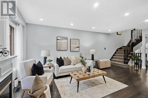 1696 Woodgate Trail, Oshawa, ON - Indoor Photo Showing Living Room With Fireplace