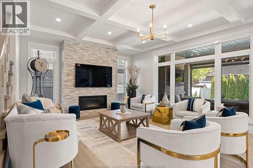258 Xavier Circle, Lakeshore, ON - Indoor Photo Showing Living Room With Fireplace