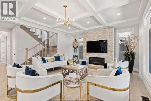 258 Xavier Circle, Lakeshore, ON - Indoor Photo Showing Living Room With Fireplace