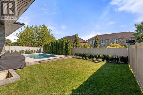 258 Xavier Circle, Lakeshore, ON - Outdoor With In Ground Pool With Backyard