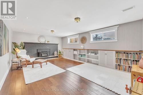 310 Surrey Drive, North Bay (Airport), ON - Indoor Photo Showing Living Room With Fireplace