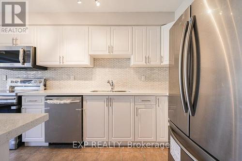 144 - 5255 Palmetto Place, Mississauga, ON - Indoor Photo Showing Kitchen With Stainless Steel Kitchen With Double Sink With Upgraded Kitchen