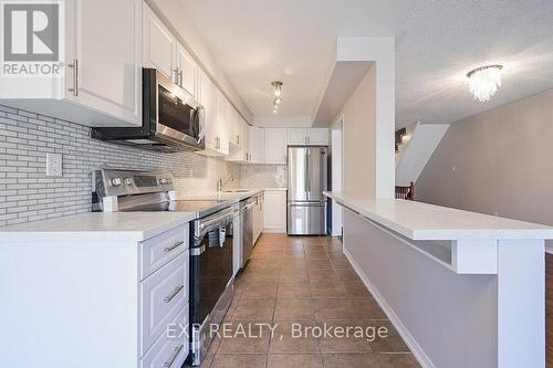 144 - 5255 Palmetto Place, Mississauga, ON - Indoor Photo Showing Kitchen With Stainless Steel Kitchen With Upgraded Kitchen