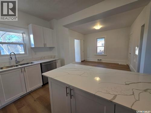 430 2Nd Avenue Ne, Swift Current, SK - Indoor Photo Showing Kitchen With Double Sink