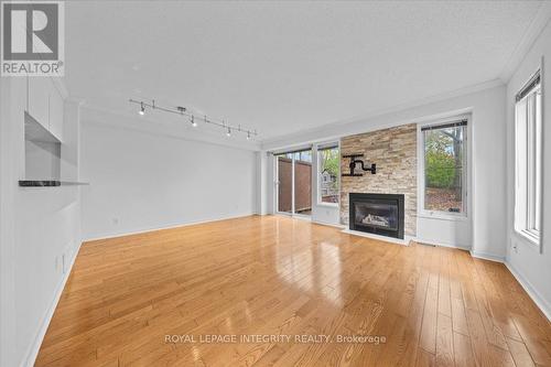 107 Corsica Private, Ottawa, ON - Indoor Photo Showing Living Room With Fireplace