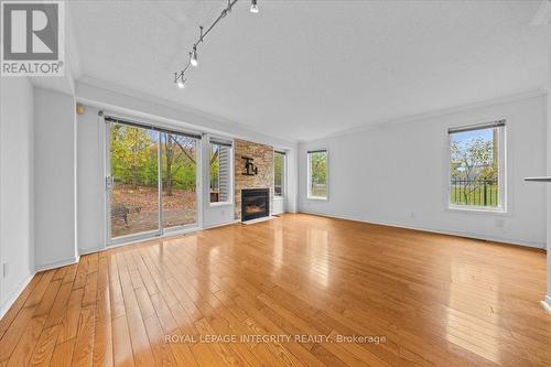107 Corsica Private, Ottawa, ON - Indoor Photo Showing Living Room With Fireplace