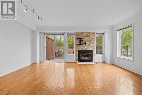107 Corsica Private, Ottawa, ON - Indoor Photo Showing Living Room With Fireplace