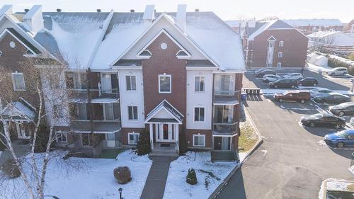 Vue d'ensemble - 302-2092 Av. Albert-Murphy, Laval (Chomedey), QC - Outdoor With Facade