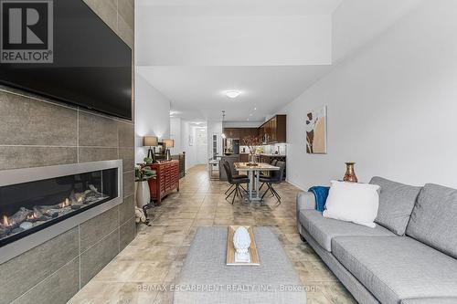 5 - 2848 King Street, Lincoln, ON - Indoor Photo Showing Living Room With Fireplace
