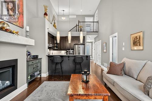 506 Chriscraft Way, Ottawa, ON - Indoor Photo Showing Living Room With Fireplace