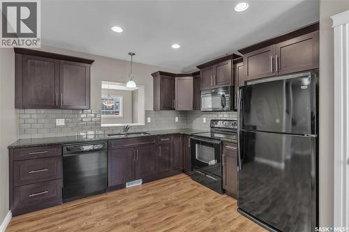103 212 Willis Crescent, Saskatoon, SK - Indoor Photo Showing Kitchen With Stainless Steel Kitchen With Upgraded Kitchen