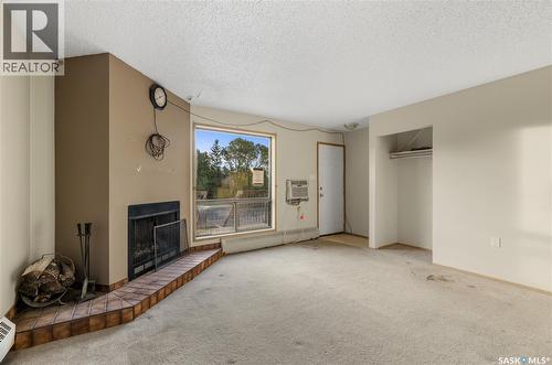 203 2931 Harding Street, Regina, SK - Indoor With Fireplace