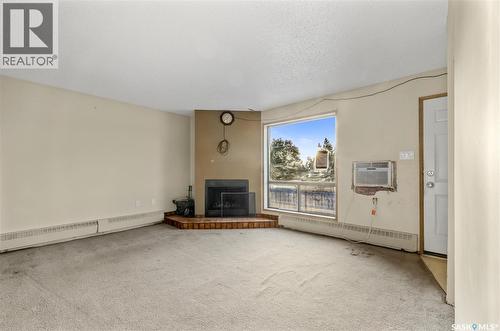 203 2931 Harding Street, Regina, SK - Indoor With Fireplace