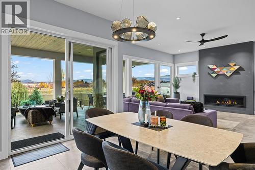 720 Turner Road, Kelowna, BC - Indoor Photo Showing Dining Room With Fireplace