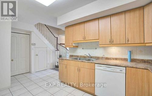 303 Grandview Way, Toronto, ON - Indoor Photo Showing Kitchen With Double Sink