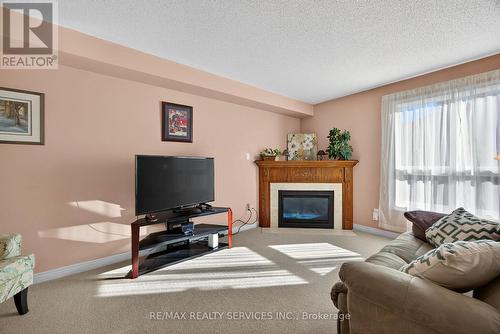 31 Gardenia Way, Caledon, ON - Indoor Photo Showing Living Room With Fireplace