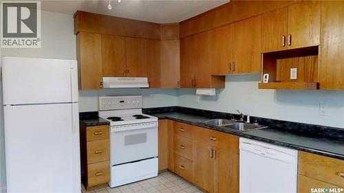 213 Stevens Avenue, Birch Hills, SK - Indoor Photo Showing Kitchen With Double Sink