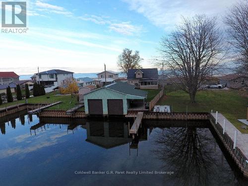 Double boathouse & dock. - 1 Duncan Street, Norfolk (Turkey Point), ON - Outdoor With Body Of Water